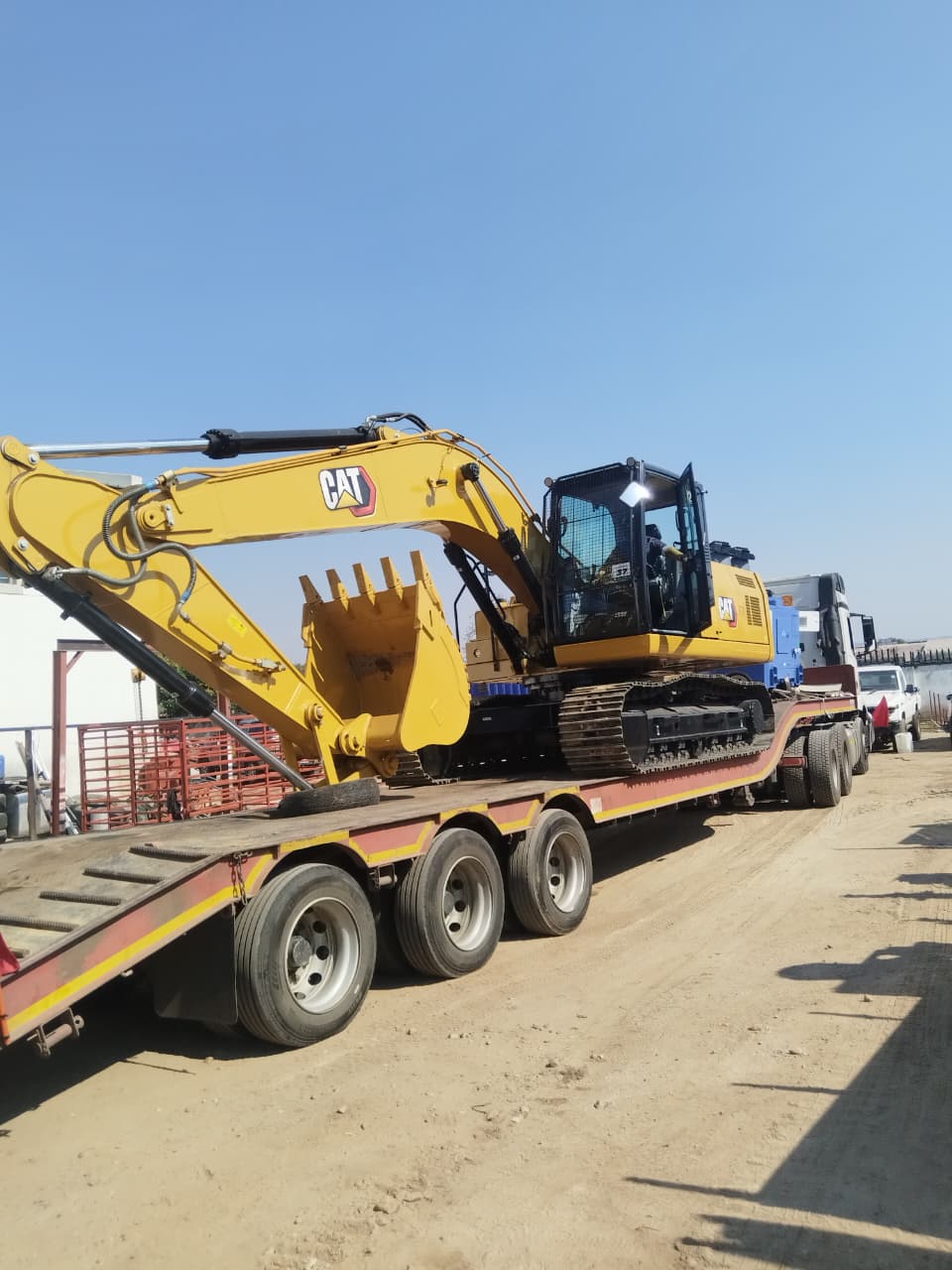 CAT 321 excavator being delivered for a Forseas Electrical project